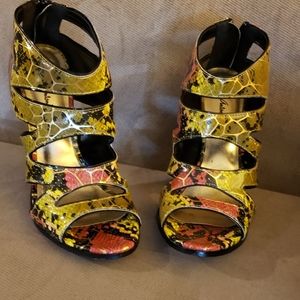Multi color Snake Skin Michael Antonio heels.